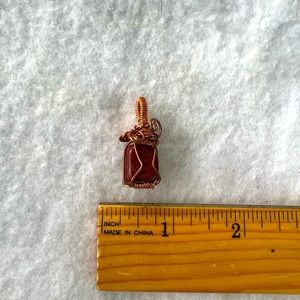 Wire wrapped gem pendant